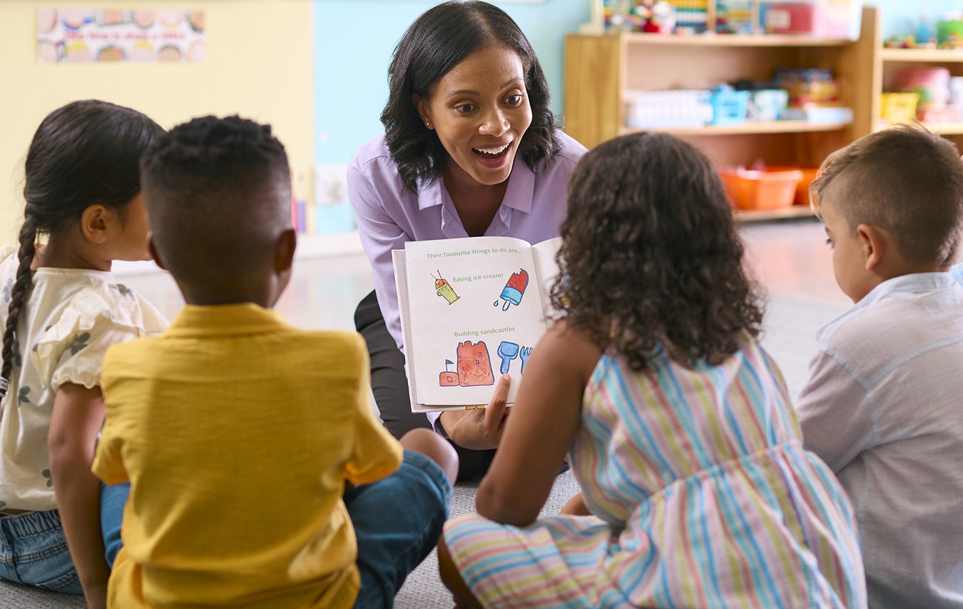 Teacher working with students in a classroom